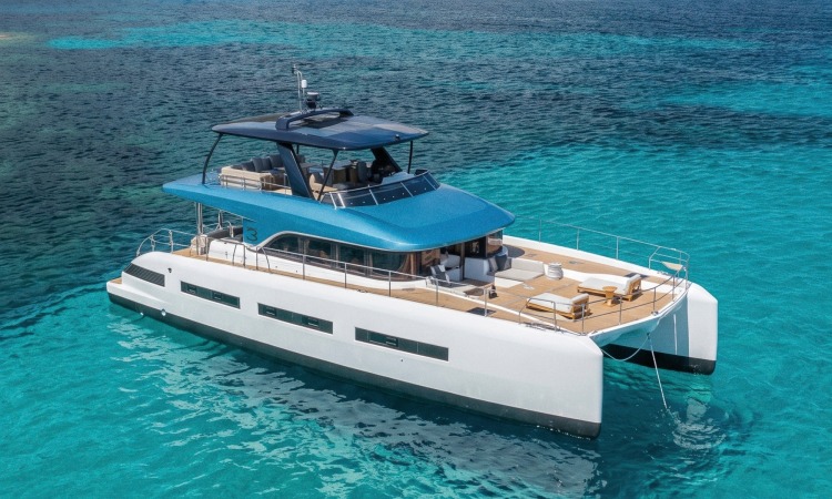 04 lagoon eighty3 catamaran anchored turquoise water