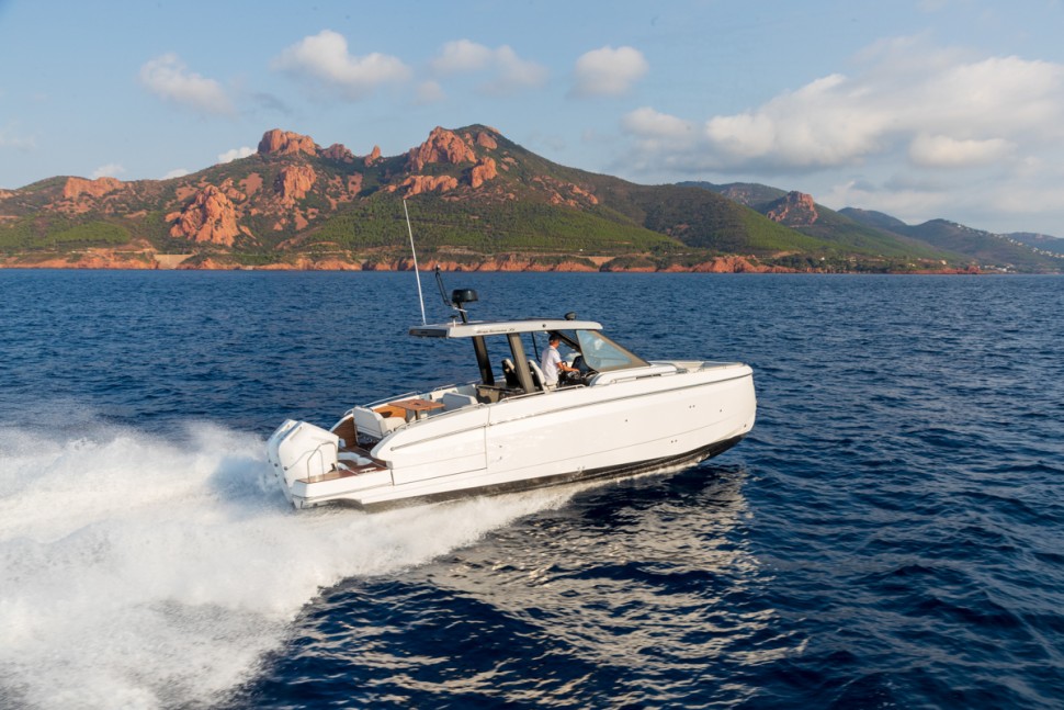 02 beneteau gran turismo 35 running shot coastal cliffs