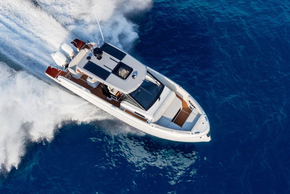 05 beneteau gran turismo 35 aerial running shot sunny